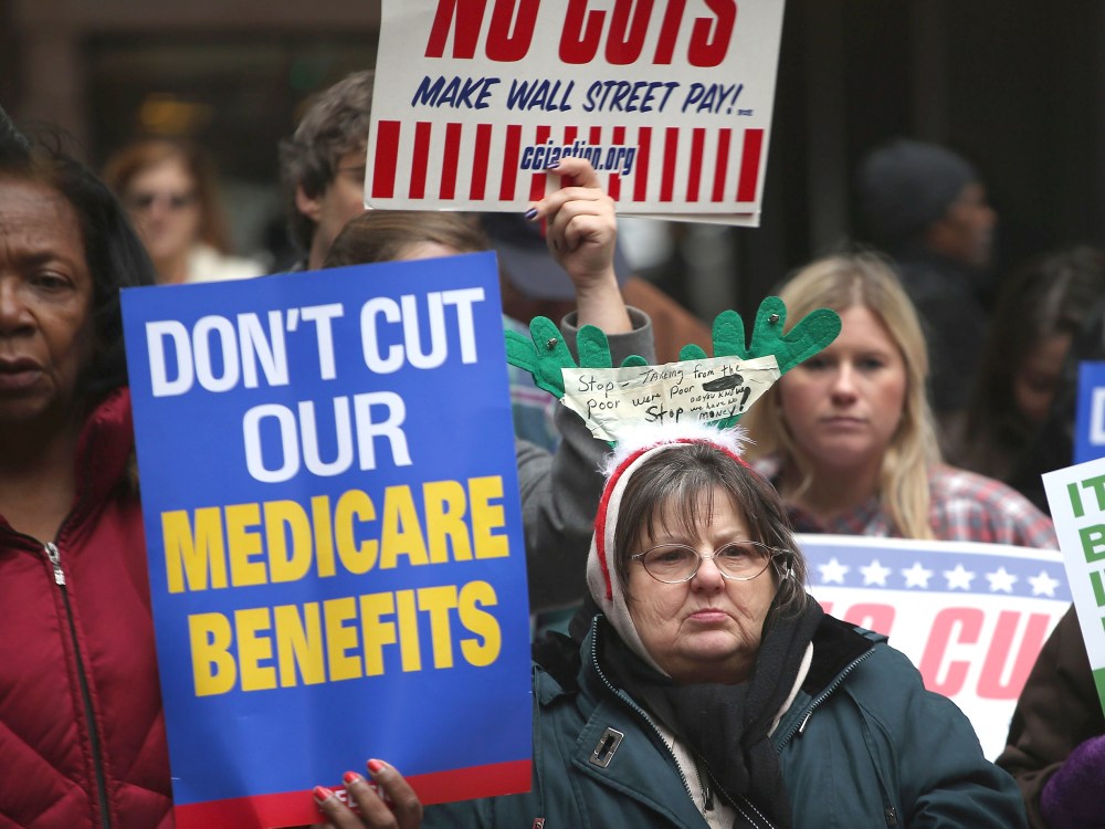 Protestors call for an increase of taxes on the wealthy and voice opposition to cuts in Social Security, Medicare, and Medicaid during a demonstration in the Federal Building Plaza on December 6, 2012 in Chicago, Illinois.  About 300 protestors...