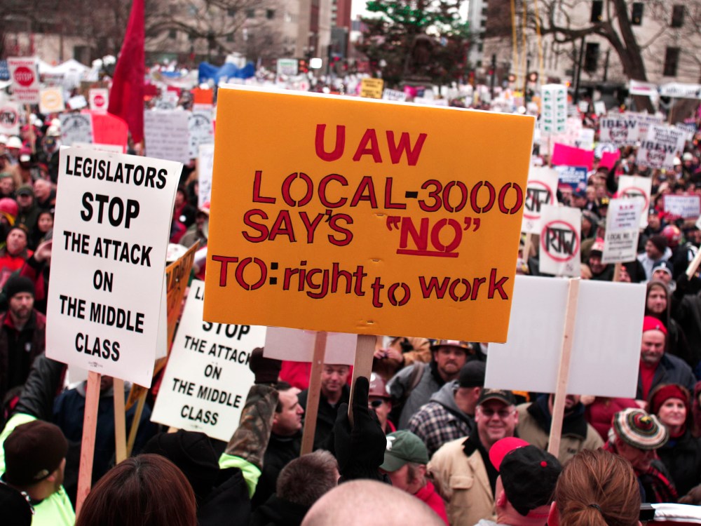 Union members from around the country rally at the Michigan State Capitol to protest a vote on Right-to-Work legislation December 11, 2012 in Lansing, Michigan. (Photo by Bill Pugliano/Getty Images)