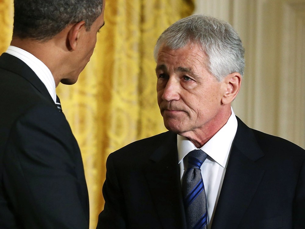 President Barack Obama shakes hands with former U.S. Sen. Chuck Hagel in the White House. Obama has nominated Hagel for the next Secretary of Defense. (Alex Wong / Getty Images)