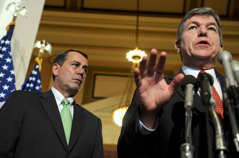 Rep. Roy Blunt (R-MO) and House Minority Leader John Boehner (R-OH) speak to reporters on Capitol Hill in Washington, October 3, 2008.
