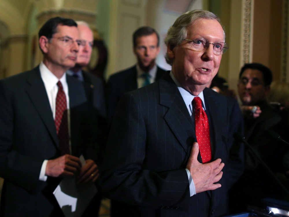 File Photo: Senate Minority Leader Sen. Mitch McConnell (R-KY) (R), speaks to the media while flanked by Sen. John Barrasso (R-WY) (L), Senate Minority Whip Sen. John Cornyn (R-TX) (2nd-L), and Sen. John Thune (R-SD) after the weekly Senate Republican...
