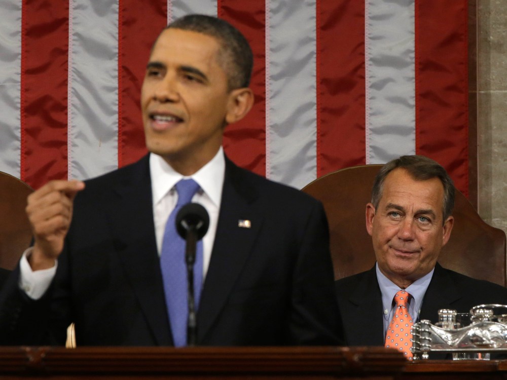 House Speaker John Boehner (R-OH) (R) listens as U.S. President Barack Obama gives his State of the Union address during a joint session of Congress at the U.S. Capitol February 12, 2013 in Washington, DC. Facing a divided Congress, Obama focused his...