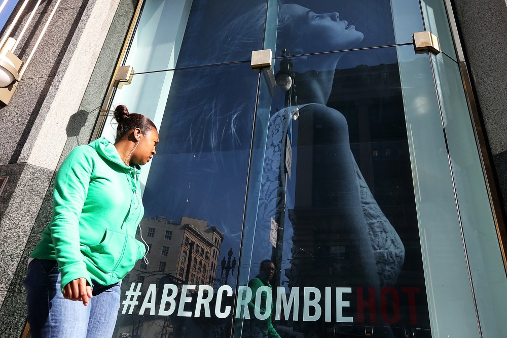 A woman stands near an Abercrombie and Fitch store on Feb. 22, 2013 in San Francisco, California.