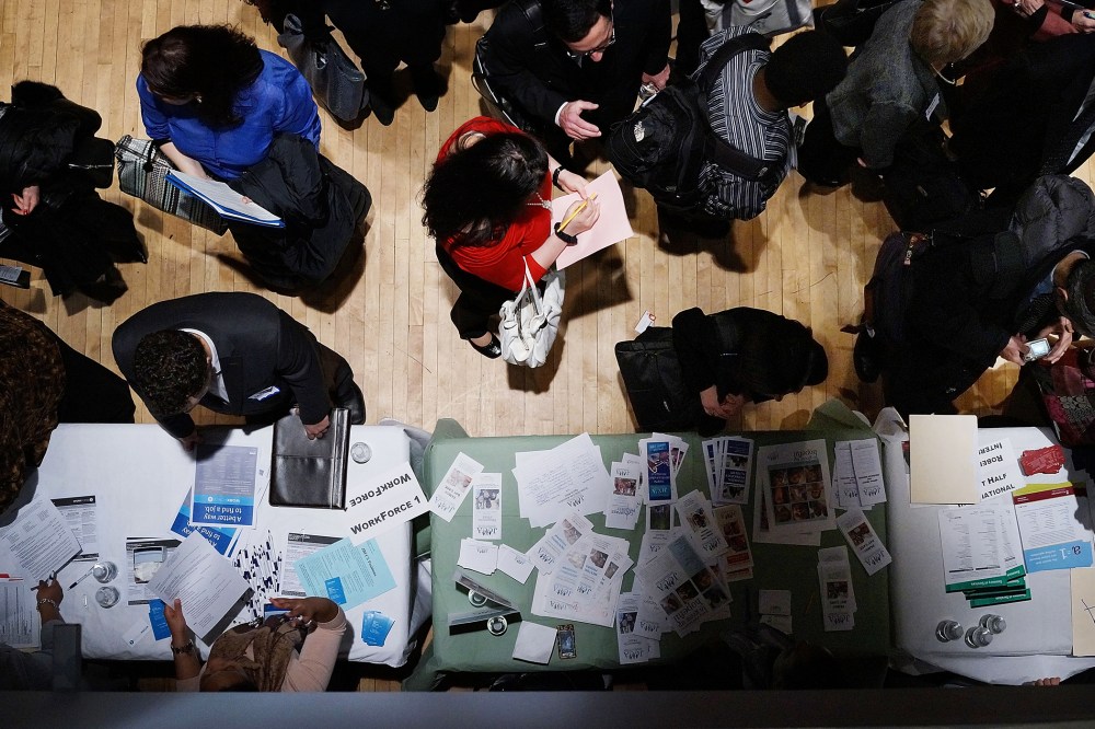 Job seekers attend a job fair at the Jewish Community Center in Manhattan, March 6, 2013.