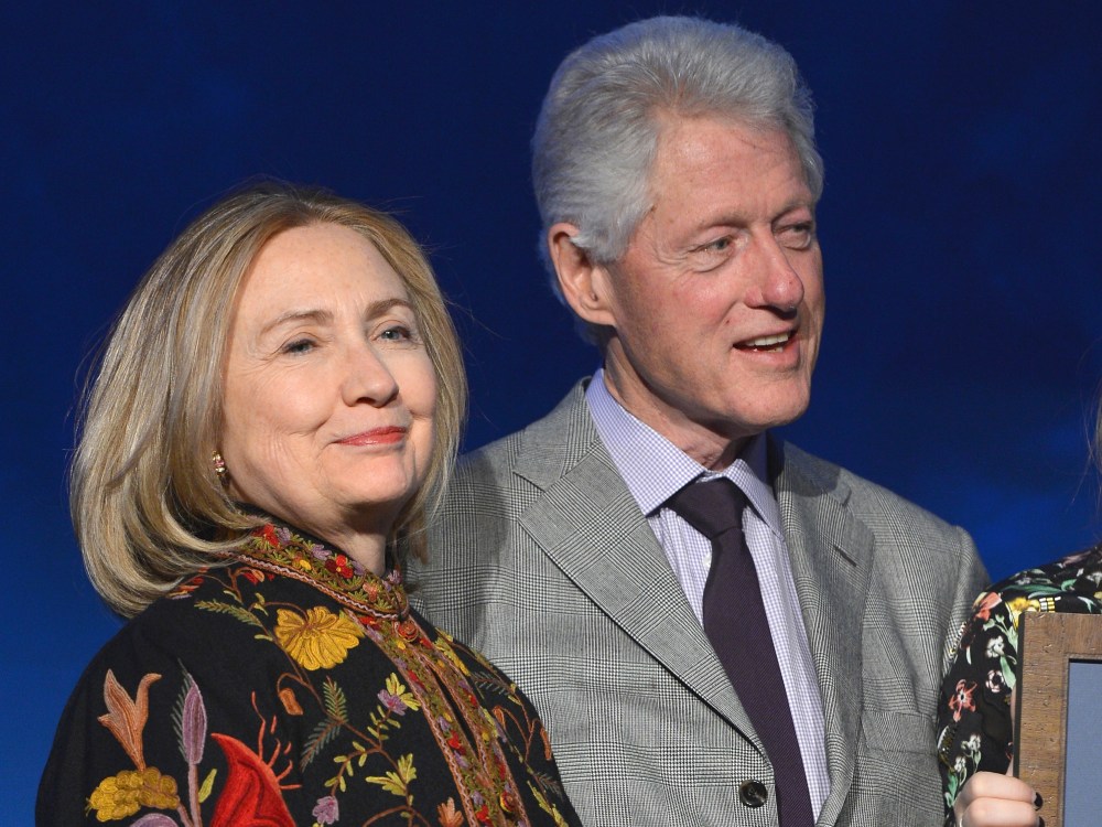 Former president Bill Clinton and former Secretary of State Hillary Clinton attend SeriousFun Children's Network event honoring Liz Robbins with celebrity guests at Pier Sixty at Chelsea Piers on April 4, 2013 in New York City.  (Photo by Larry Busacca...
