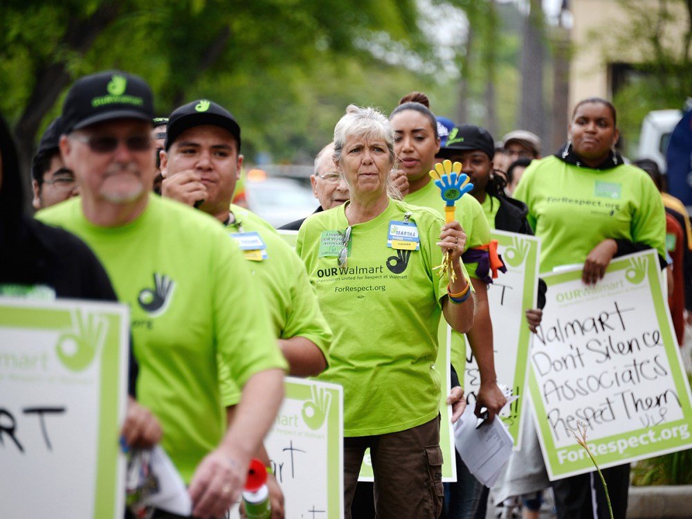 Walmart Workers Begin Bus Rally Heading To Protest At Company's Annual Meeting