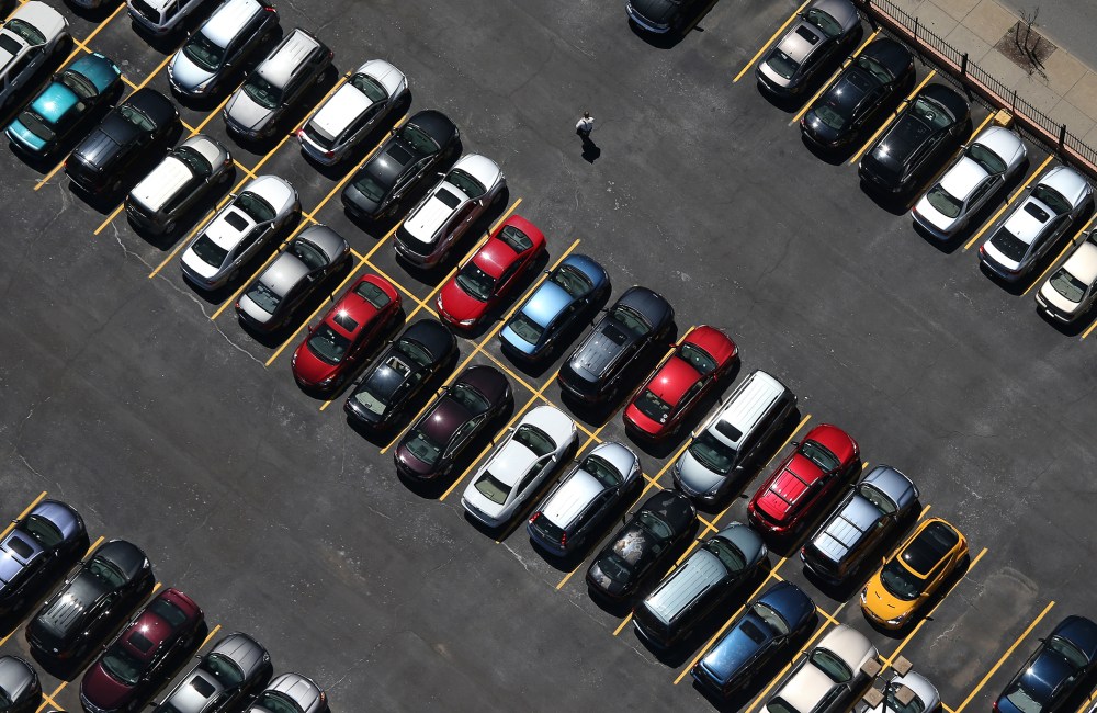 A man walks through a parking lot on June 4, 2013 in Buffalo, New York, near the U.S.-Canada border.