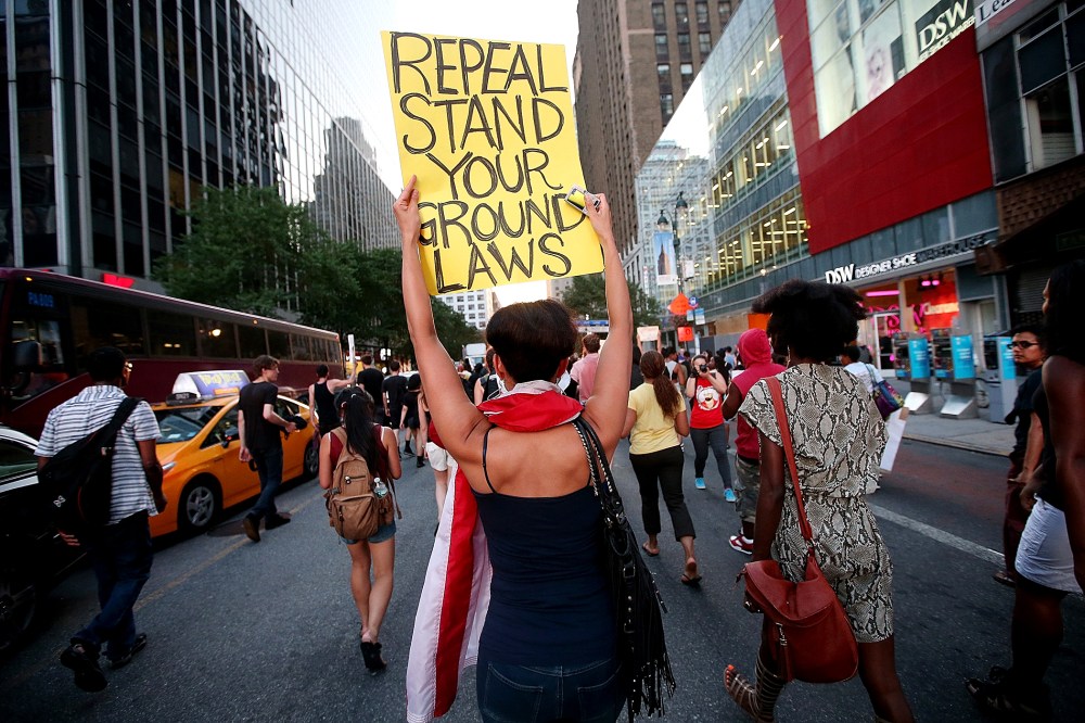 People march through the street after a rally for Trayvon Martin, July 14, 2013, in New York, N.Y.