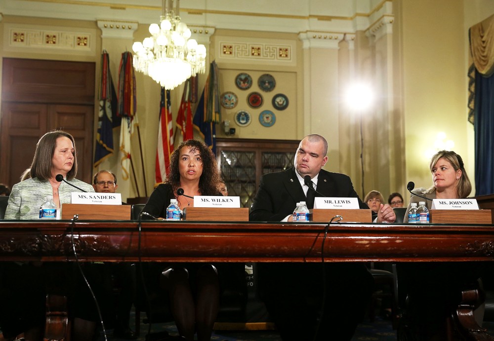 Military sexual assault survivors sit at the witness table while participating in a House Veteran Affairs Subcomittee on Capitol Hill, July 19, 2013 in Washington, DC.