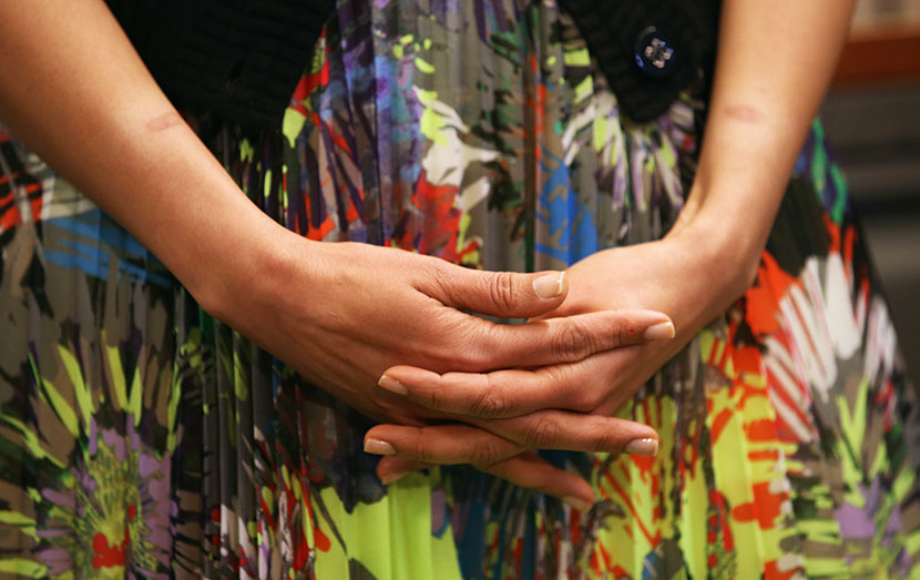 Huma Abedin, wife of Anthony Weiner, a leading candidate for New York City mayor, listens as her husband speaks at a press conference on July 23, 2013 in New York City where Weiner addressed news of new allegations that he engaged in lewd online...