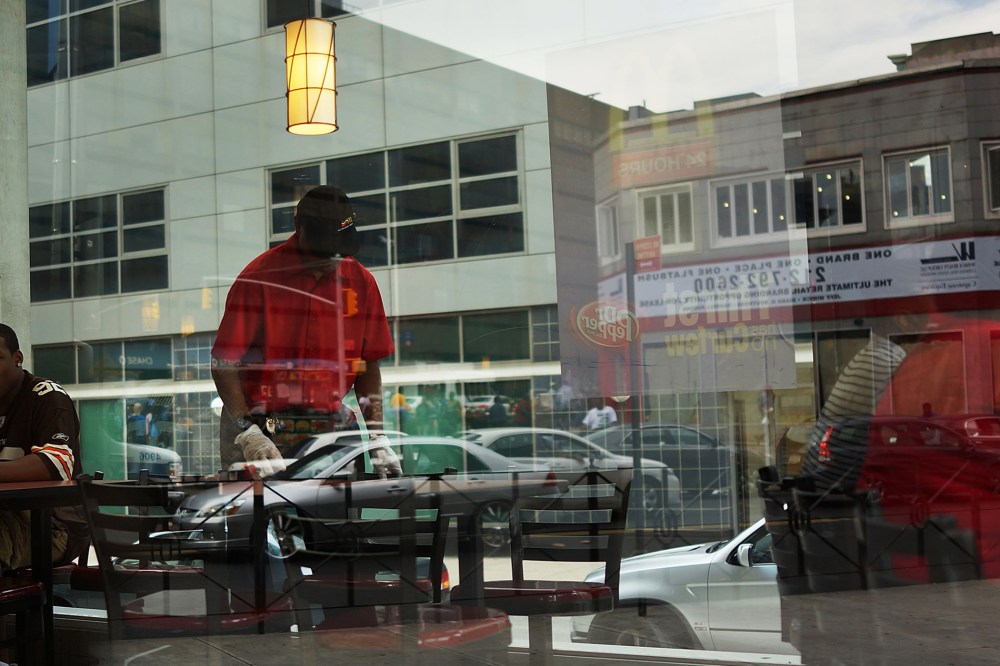 A man works inside a McDonald's fast food restaurant on Aug. 23, 2013 in the Brooklyn borough of New York, N.Y.
