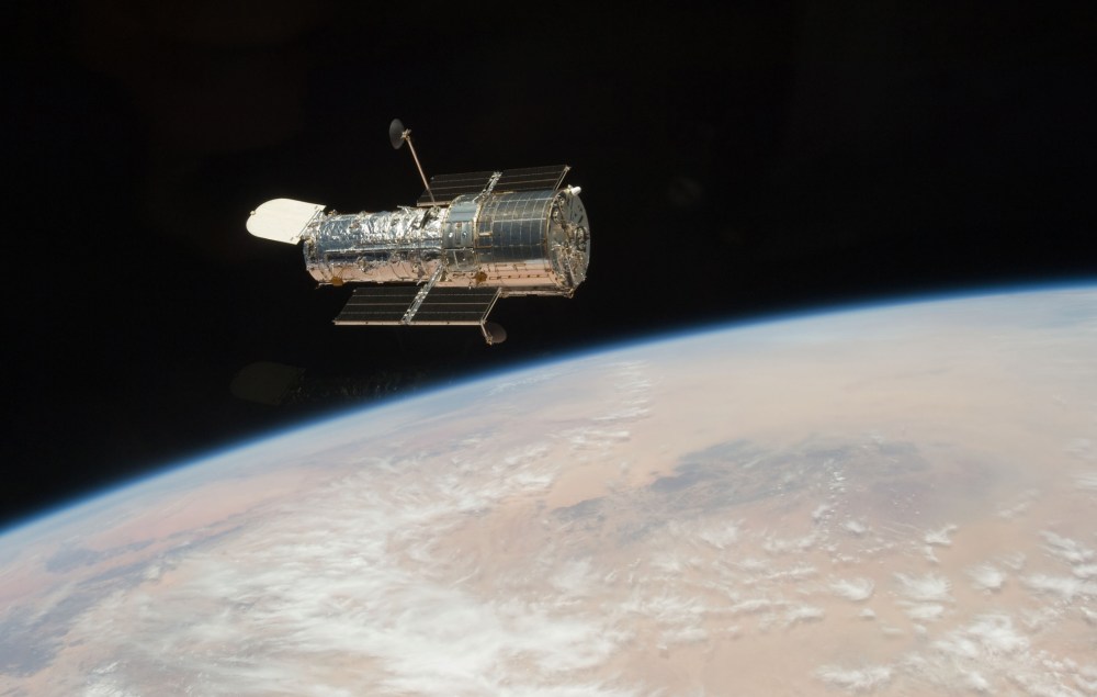 In this Tuesday, May 19, 2009 photo released by NASA, the Hubble Space Telescope is seen from the Space Shuttle Atlantis.