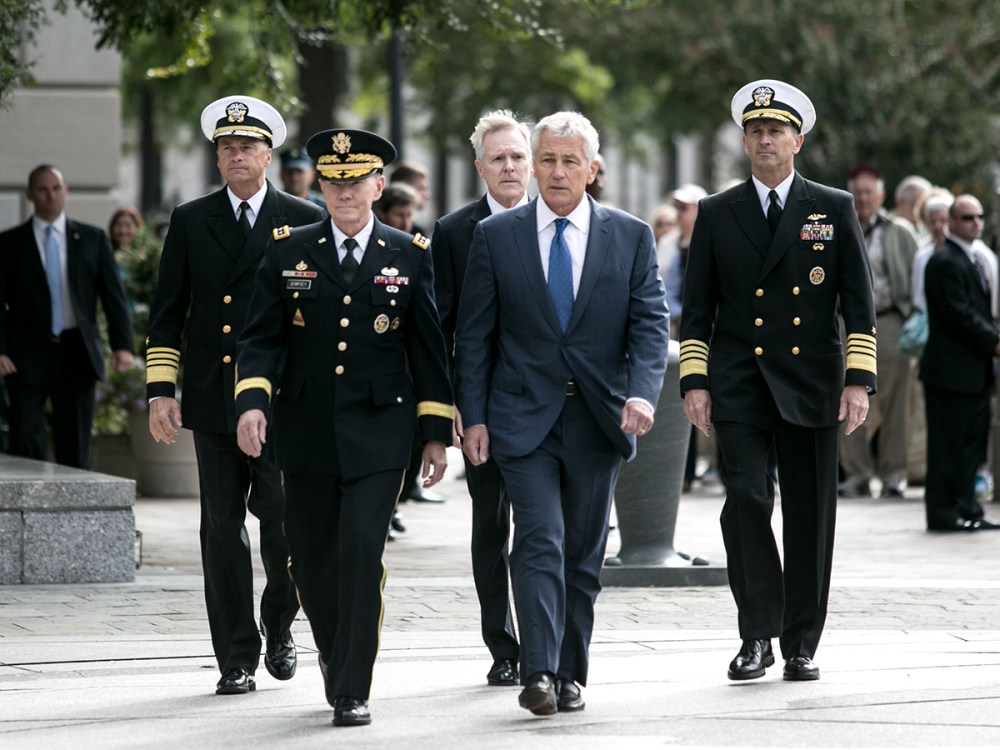 Defense Secretary Chuck Hagel Lays Wreath For Navy Yard Shooting Victims