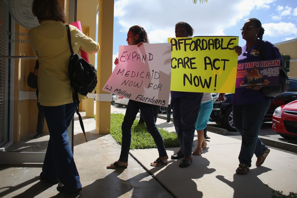 Activists Demonstrate In Support Of Medicaid Expansion And The Affordable Care Act in Miami, Florida, September 20, 2013.