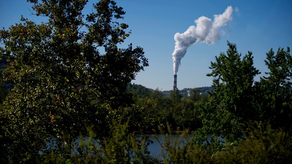 A plume of exhaust extends from a coal-fired power plant on Sept. 24, 2013 in New Eagle, Pa. (Photo by Jeff Swensen/Getty)