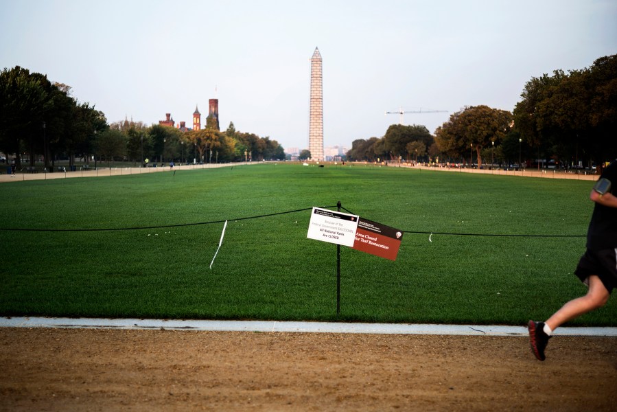 A man runs through a closed National Mall in Washington, DC, Oct 3, 2013.