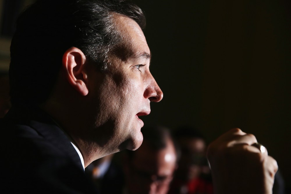 U.S. Sen. Ted Cruz (R-TX) speaks to members of the media after a meeting with the Senate Republicans at the U.S. Capitol on Oct. 16, 2013 on Capitol Hill in Washington, DC.