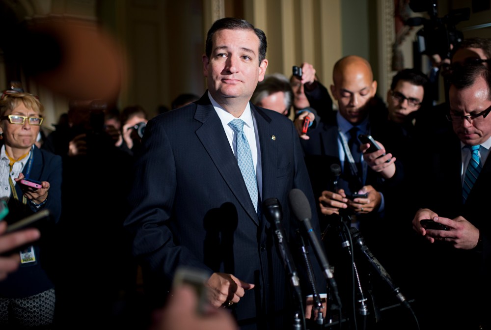 Sen. Ted Cruz, R-Texas, talks with reporters after a meeting of Senate republicans in the Capitol.