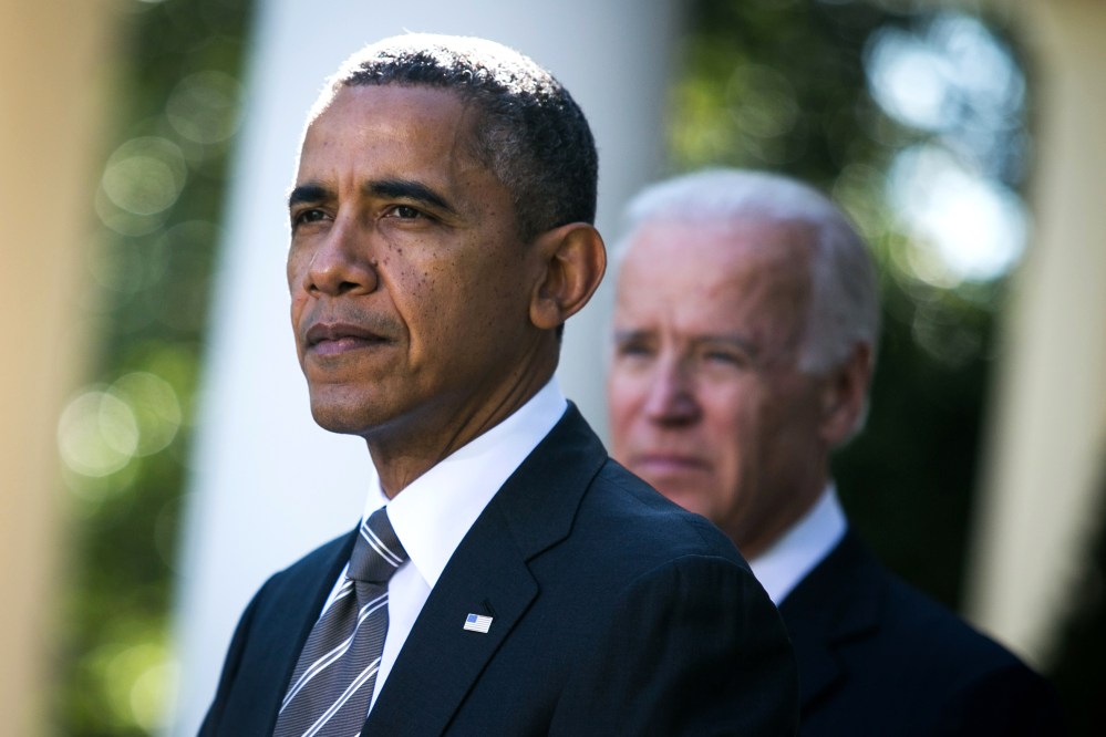 U.S. President Barack Obama and U.S. Vice President Joe Biden are seen during an event to introduce Jeh Johnson as the president's nominee to be the next Secretary of the Department of Homeland Security