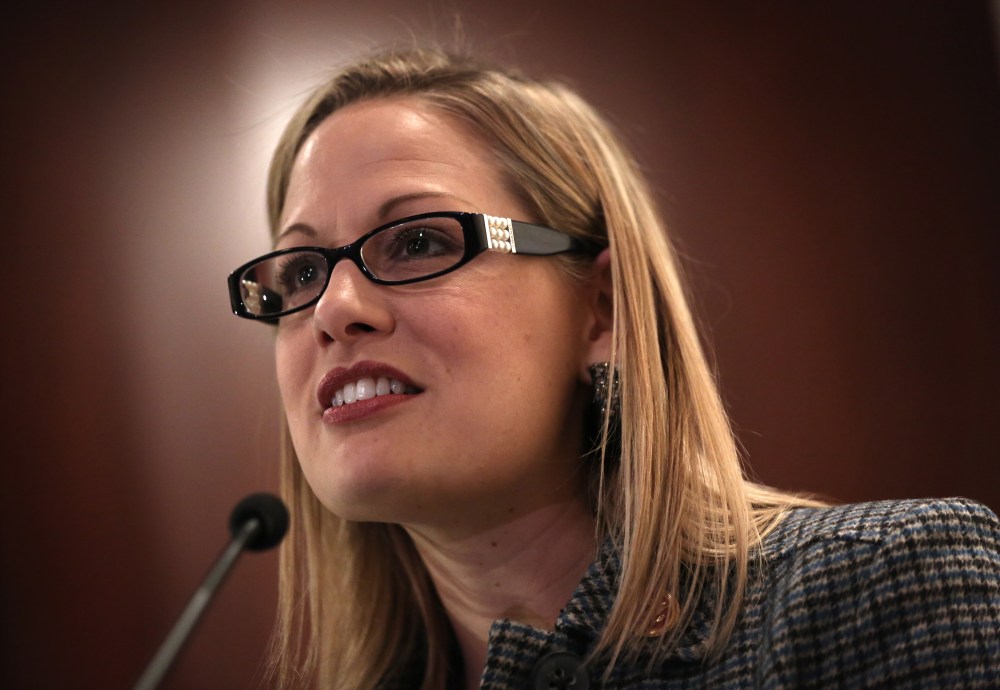 U.S. Rep. Kyrsten Sinema (D-AZ) speaks during a discussion on immigration reform October 23, 2013 on Capitol Hill in Washington, DC.