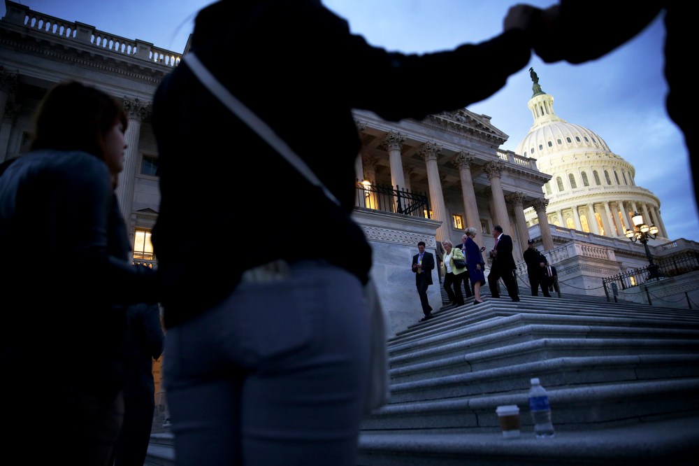 Activists rally for immigration reform in front of the U.S. Capitol, Oct. 23, 2013.