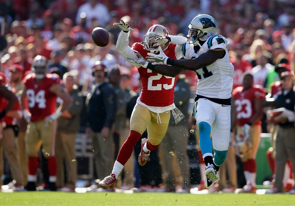 Tarell Brown #25 of the San Francisco 49ers breaks up a pass intended for Brandon LaFell #11 of the Carolina Panthers during a regular season meeting at Candlestick Park, Nov. 10, 2013 in San Francisco, Calif.