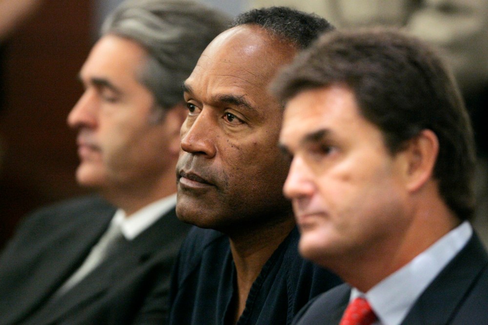 O.J. Simpson appears in court with his attorneys in Las Vegas, Sept. 19, 2007. (Photo by Barry Sweet/ZUMA)