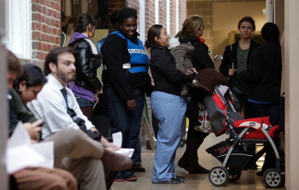 Voters line up to cast their votes during the U.S. presidential election at the School Without Walls polling station in Washington, November 6, 2012. (Photo by Yuri Gripas/Reuters)
