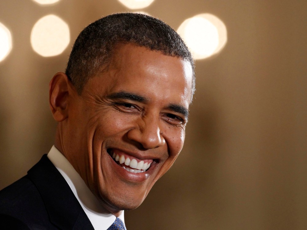 U.S. President Barack Obama smiles while addressing his first news conference since his reelection, at the White House in Washington November 14, 2012. (Photo by Kevin Lamarque/Reuters)