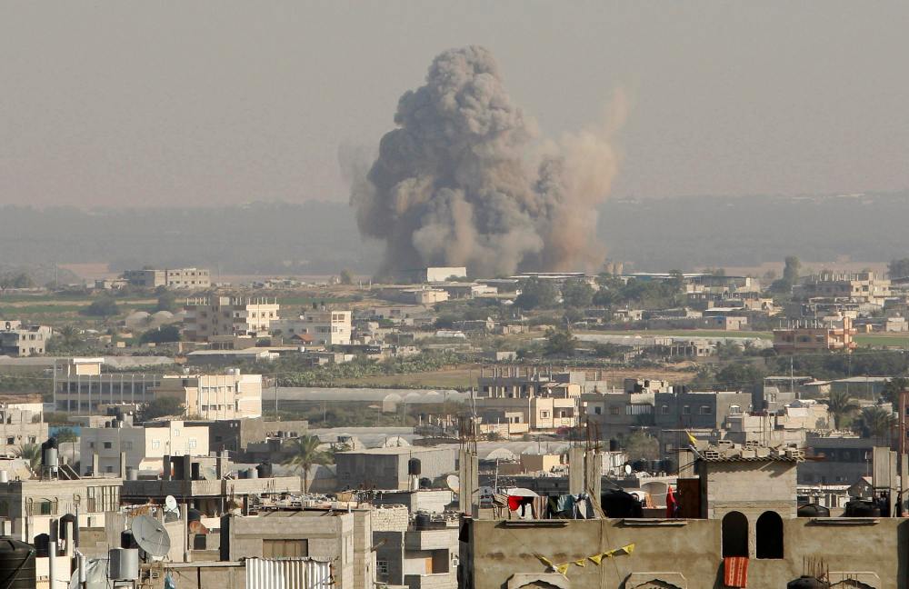 Smoke rise after what witnesses said was an Israeli air strike in Rafah in the southern Gaza Strip November 20, 2012. The U.N. chief called for an immediate ceasefire in the Gaza Strip on Tuesday and U.S. Secretary of State Hillary Clinton headed to...