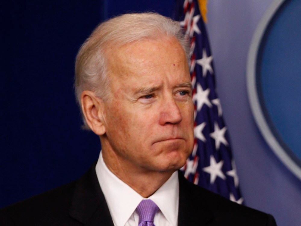 Vice President Joe Biden looks on as the U.S. President Barack Obama speaks to members of the media in the White House Briefing Room December 19, 2012. Obama announced that Biden will lead an effort to come up with policies to address gun violence...