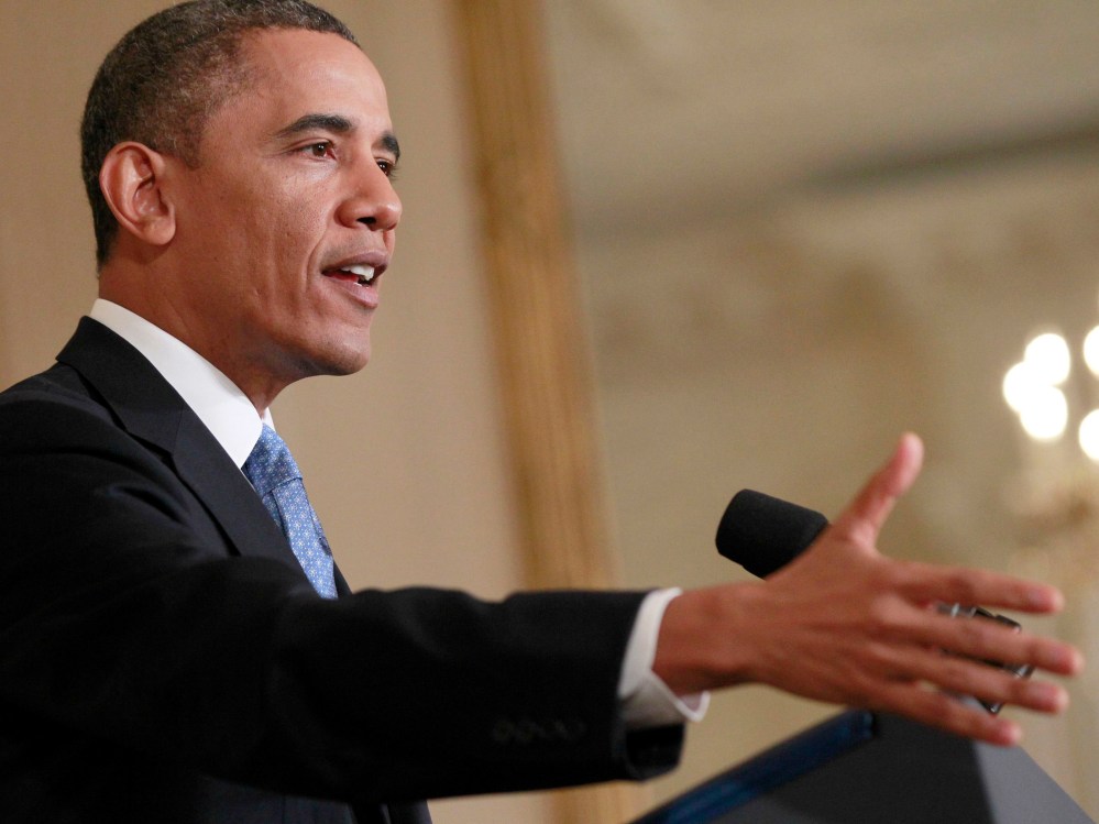 President Obama speaking in the East Room of the White House in Washington on January 14, 2013. (Photo by Jason Reed/Reuters)
