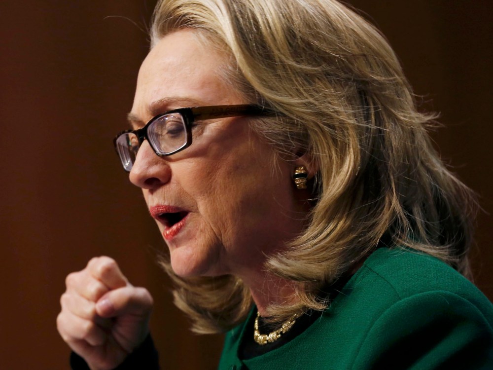 Secretary of State Hillary Clinton pounds on her fist on her table while testifying on the September attack on U.S. diplomatic sites in Benghazi, Libya during a hearing held by the U.S. Senate Foreign Relations Committee on Capitol Hill in Washington...
