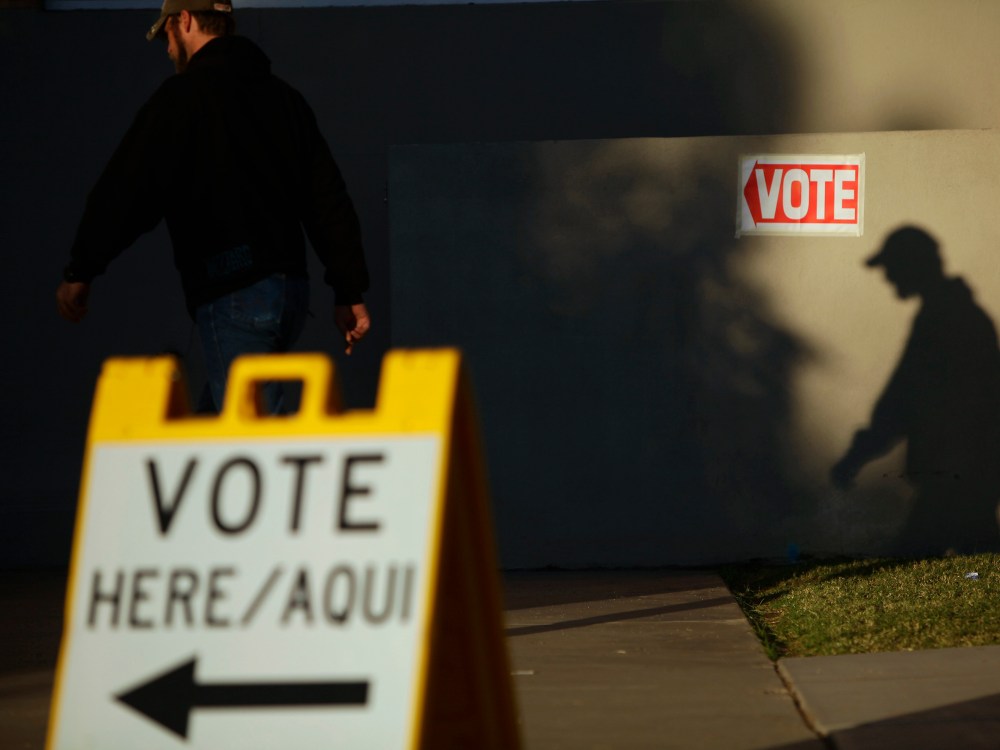 File Photo: A voter casts his shadow on a wall as he arrives at a polling place during the U.S. presidential election in Phoenix, Arizona, in this November 6, 2012 file photo. (Photo by Joshua Lott/Reuters/Files)