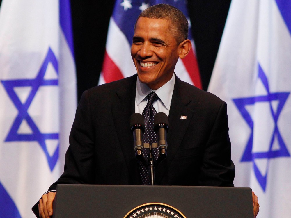 U.S. President Barack Obama smiles while he addresses students at the Jerusalem Convention Center in Jerusalem, March 21, 2013. Obama, delivering a keynote speech to Israeli students, said on Thursday that continued settlement activity was ...