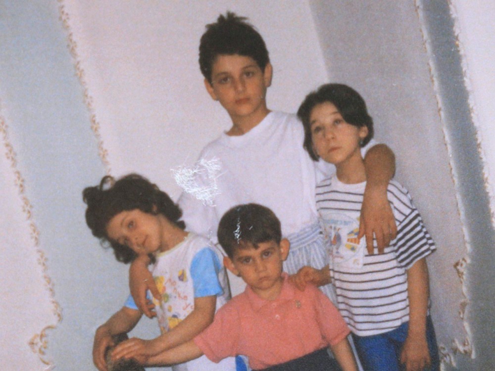 A photo showing Dzhokhar (C, bottom) and Tamerlan (C, top) Tsarnaev, accompanied by their sisters, is seen in this photo provided by the Suleimanova family, in Makhachkala April 22, 2013. (REUTERS/Courtesy of Suleimanova family/Handout)