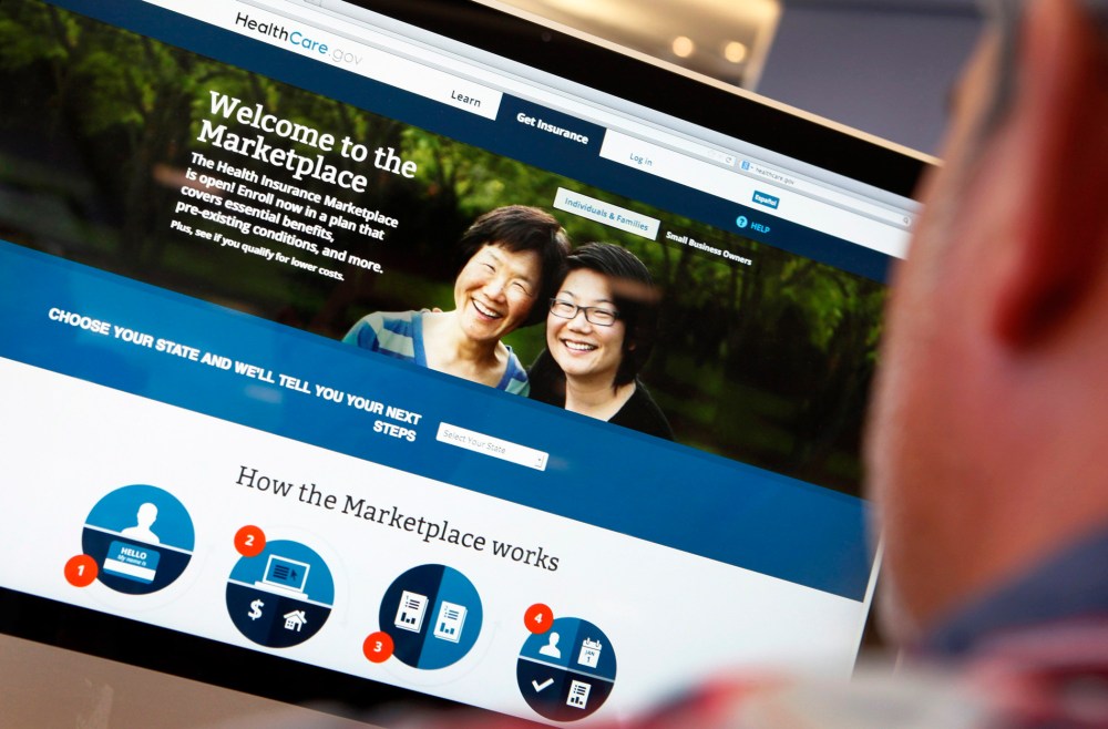 A man looks over the Affordable Care Act signup page on the HealthCare.gov website in New York in this October 2, 2013 file photo illustration.