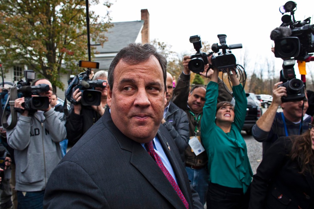 New Jersey Governor Chris Christie speaks with media after casting his vote during the New Jersey governor election in Mendham Township, New Jersey, November 5, 2013.