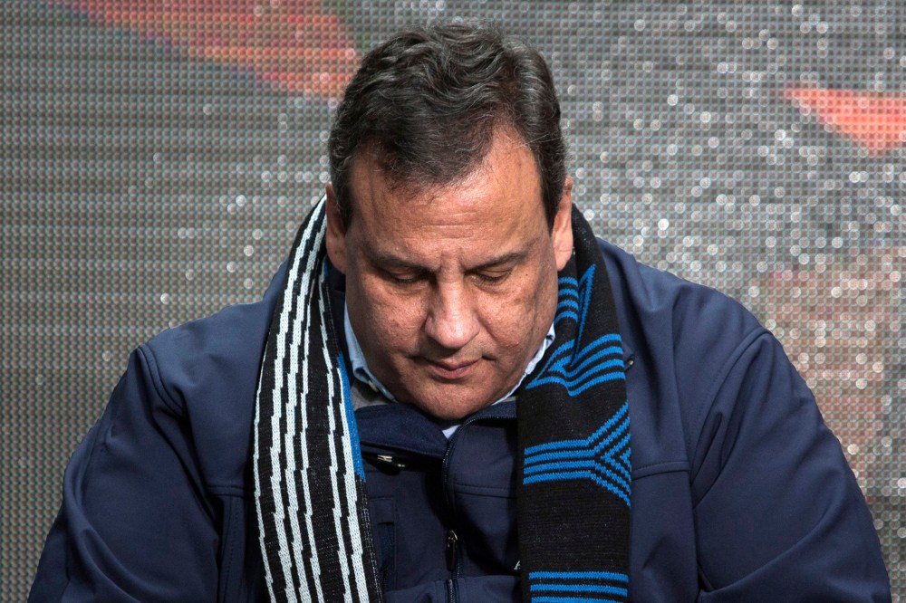 New Jersey Governor Chris Christie sits on stage during the Super Bowl ceremony in New York on Feb. 1, 2014.