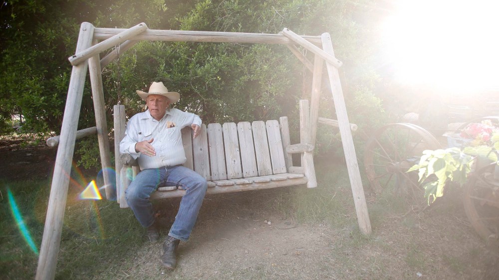 Rancher Cliven Bundy sits on a swing at his home in Bunkerville, Nevada April 12, 2014.