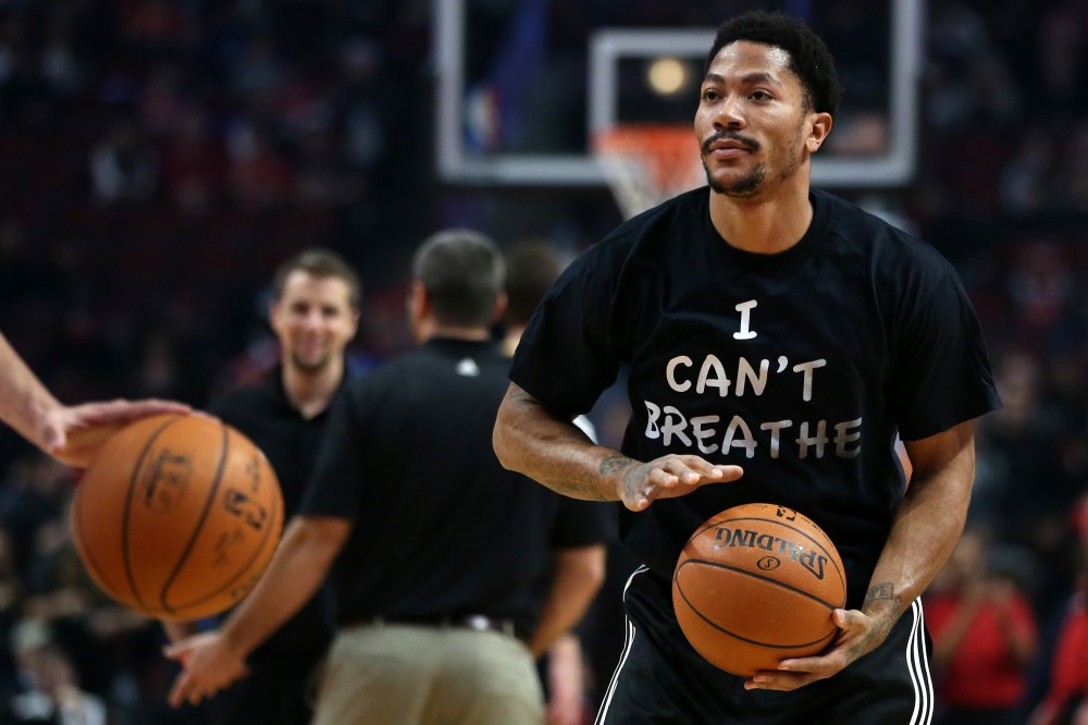 Chicago Bulls guard Derrick Rose wears a shirt reading ''I Can't Breathe'' while warming up for a game against the Golden State Warriors on Dec. 6, 2014 at the United Center in Chicago. (Chris Sweda/TNS/Zuma)