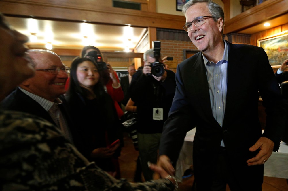 Former Governor of Florida Jeb Bush greets attendees at a fundraiser for U.S. Rep. David Young (R-IA) in Urbandale, Iowa on March 6, 2015.