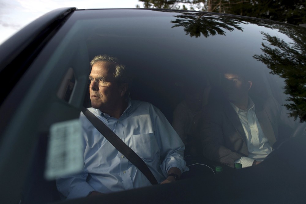 Republican presidential candidate Jeb Bush leaves following a town hall gathering at Turbocam International in Barrington, N.H., on Aug. 7, 2015. (Photo by Gretchen Ertl/Reuters)