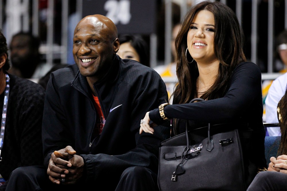 Los Angeles Lakers' Lamar Odom and his wife television personality Khloe Kardashian sit courtside as they attend the 2011 NBA All-Star basketball weekend in Los Angeles, Feb. 18, 2011. (Photo by Danny Moloshok/File/Reuters)