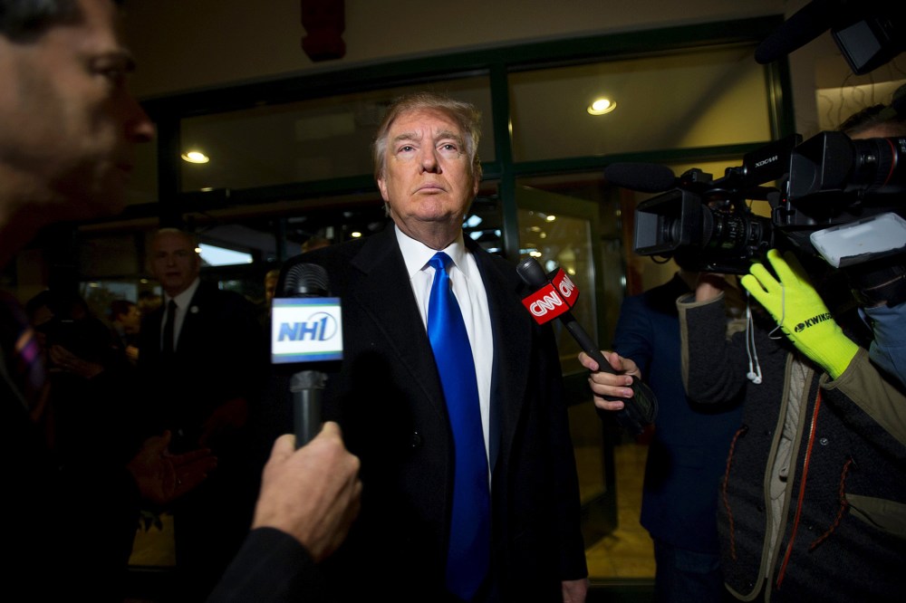 U.S. Republican presidential candidate Donald Trump talks to members of the media before a campaign event in Atkinson, N.H., Oct. 26, 2015. (Photo by Gretchen Ertl/Reuters)