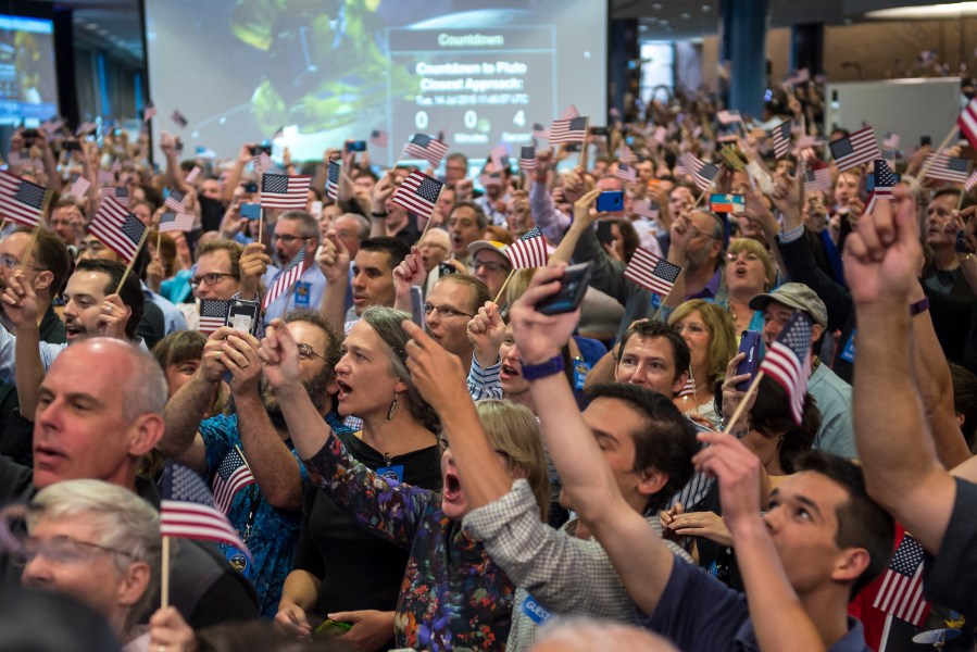 New Horizons Pluto Flyby (Courtesy of Bill Ingalls/NASA).