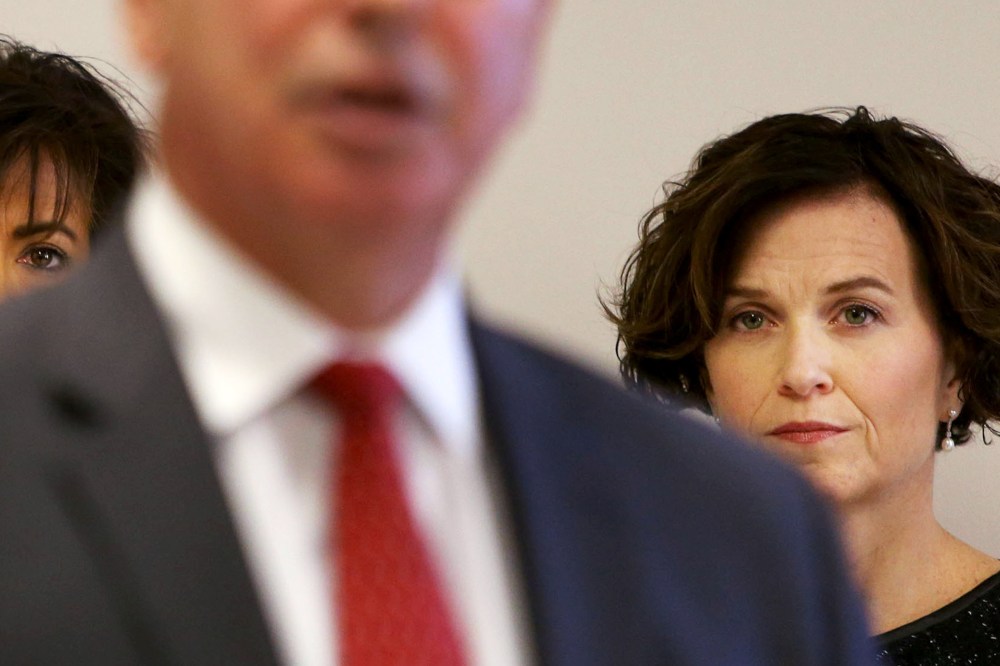 Minneapolis mayor Betsy Hodges, on right, listens as Hennepin County Attorney Mike Freeman speaks during a press conference at City Hall. Nov. 13, 2015, in Minneapolis, Minn. (Photo by David Joles/Minneapolis Star Tribune/ZUMA)