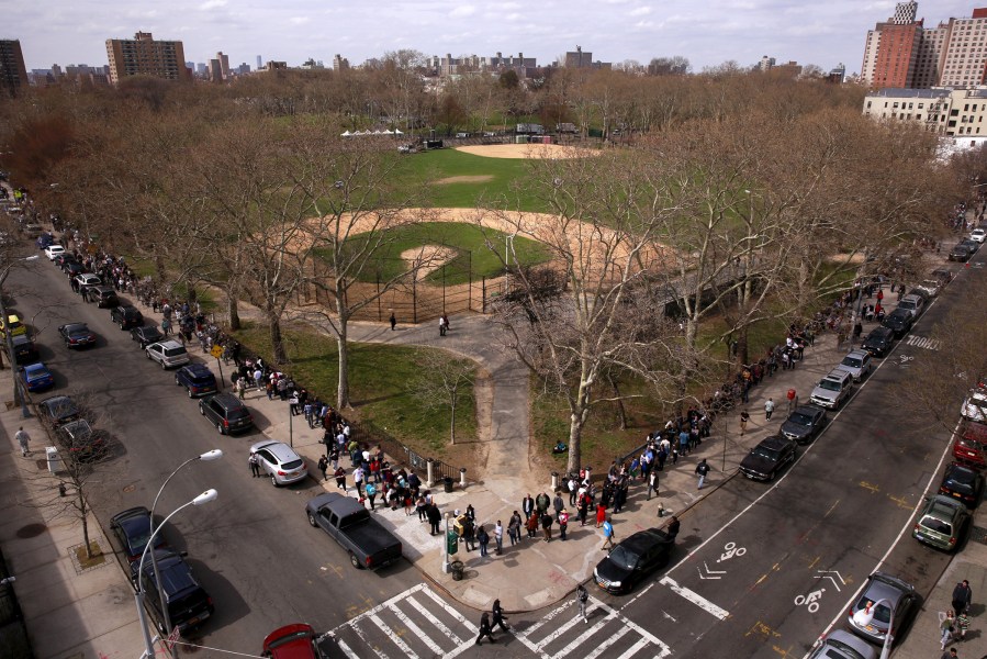 Attendees line up to take part in a campaign rally for Democratic presidential candidate Bernie Sanders at Saint Mary's Park in Bronx, New York, March 31, 2016. (Photo by Lucas Jackson/Reuters)
