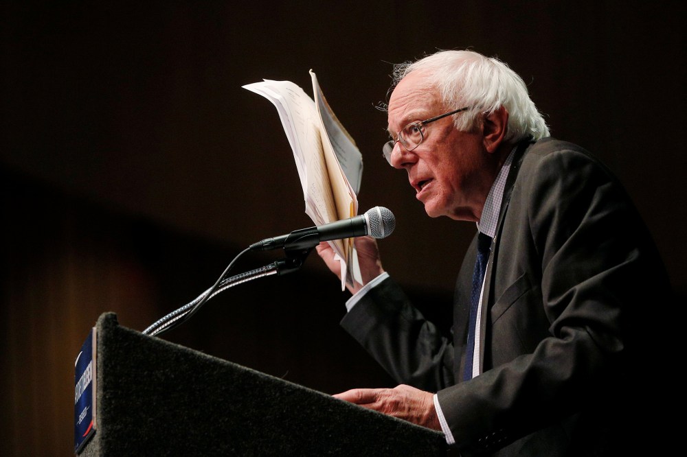Democratic presidential candidate and Senator Bernie Sanders holds up his notes while speaking about his attempts to influence the Democratic party's platform during a speech in Albany, New York, June 24, 2016. (Photo by Bryan Snyder/Reuters)