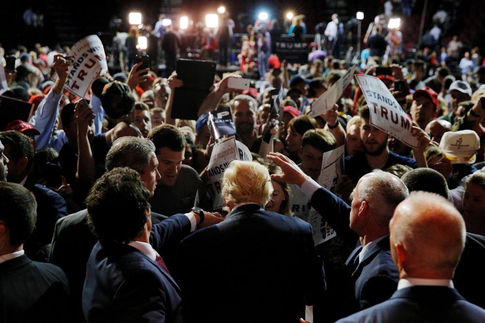 Republican presidential candidate Donald Trump greets audience members at a campaign rally in Bangor, Maine, June 29, 2016. (Photo by Bryan Snyder/Reuters)